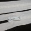 Zips vetrovkový, kosticový - UH - 60 cm - Biela 01