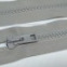 Zips vetrovkový, kosticový - UH - 30 cm - špirála 6mm - Svetlošedá 39
