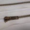 Zips vetrovkový, kosticový - KOV - 85 cm - Smotanová 03