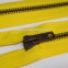 Zips vetrovkový, kosticový - KOV - 85 cm - Tmavožltá 07
